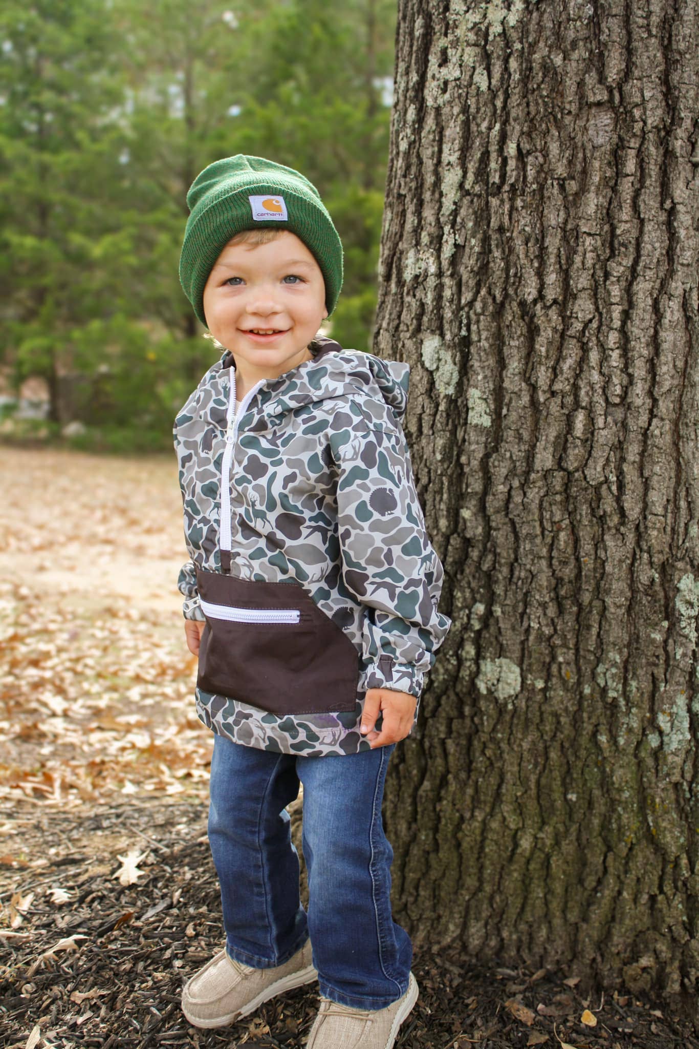 An application scenario or product detail of boys camo rain jacket - Image 8