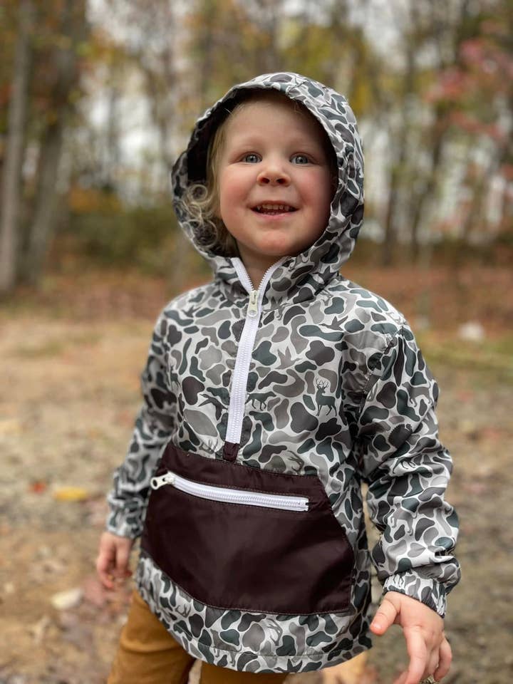 An application scenario or product detail of boys camo rain jacket - Image 10