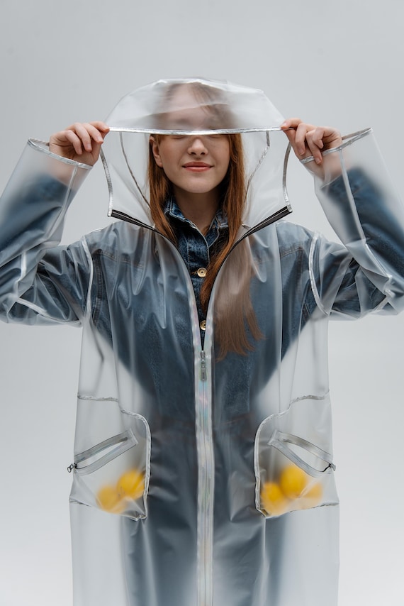 An application scenario or product detail of clear raincoat women in plastic raincoats - Image 3