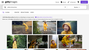 Getty Images - Yellow Raincoat Boy Stock Photos