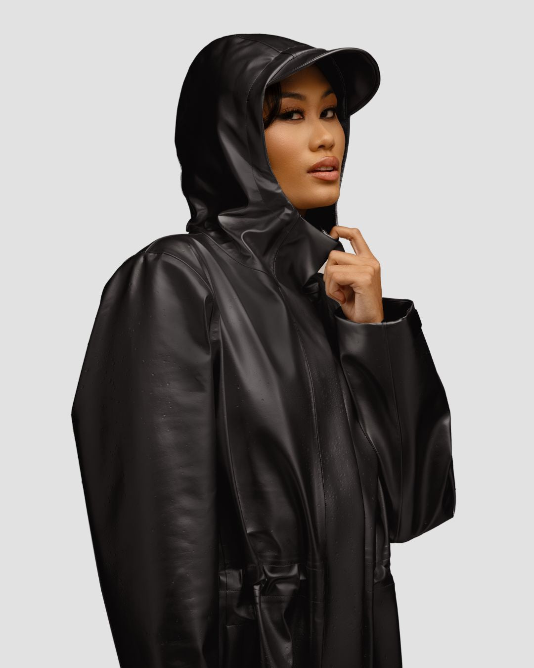 An application scenario or product detail of girls black raincoat - Image 1